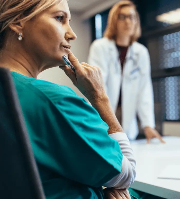 Healthcare leaders in a strategy discussion